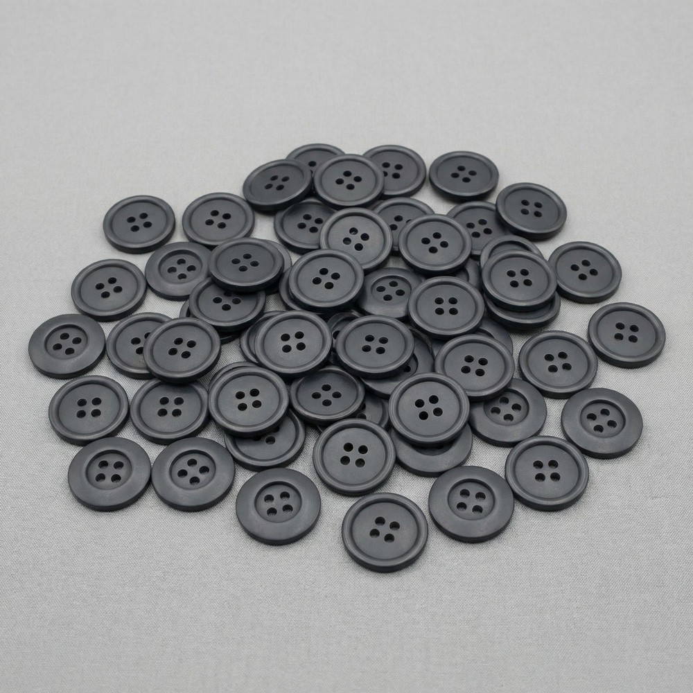 Botones negros de costura en gruesa 144 uds | Suministro textil B2B