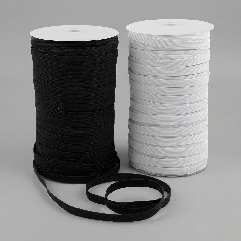 Goma elástica textil en bobina blanco y negro | Suministro textil B2B