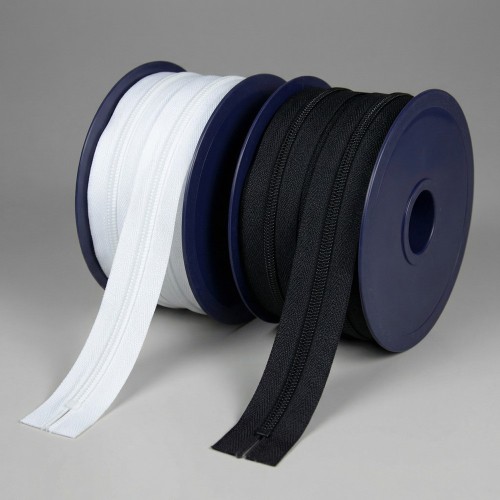 Cremallera Continua Industrial en Bobina Blanca y Negra | Suministro Textil Profesional